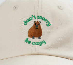 Additional view of Don't Worry, Be Capy embroidered baseball hat for kids and adults