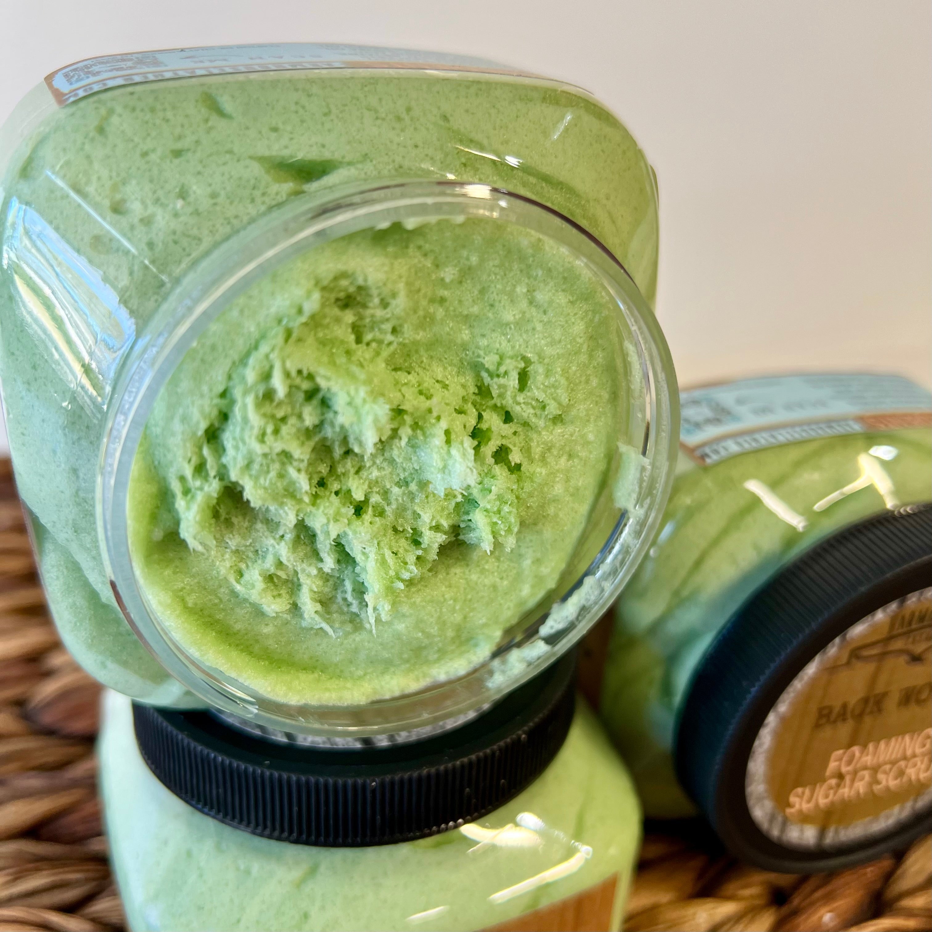 Close up of Back Woods foaming sugar scrub texture by Farmhouse Lather for exfoliating body care