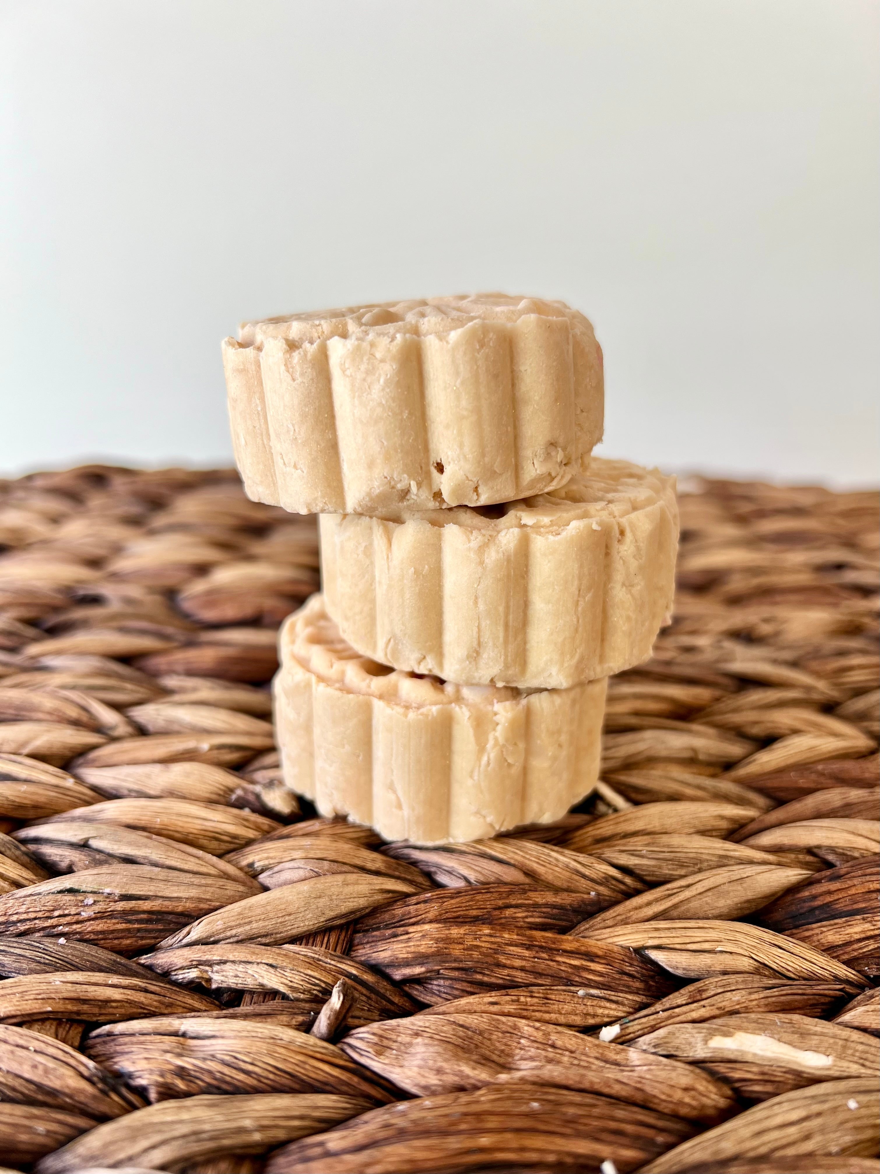 Back Woods tan shampoo bar by Farmhouse Lather with bottle free hair care packaging