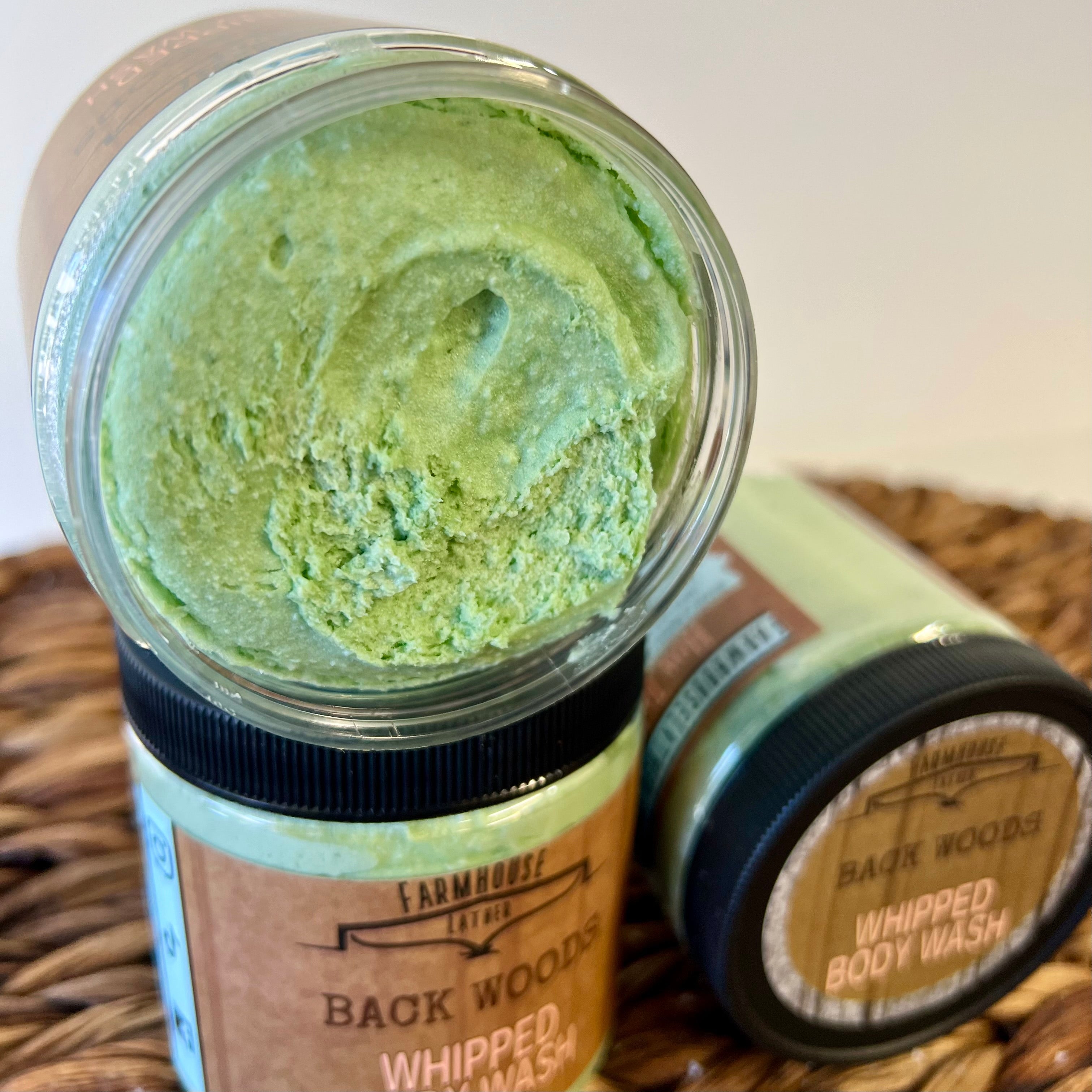 Close up of Farmhouse Lather Back Woods whipped body wash texture with jojoba oil and argan oil