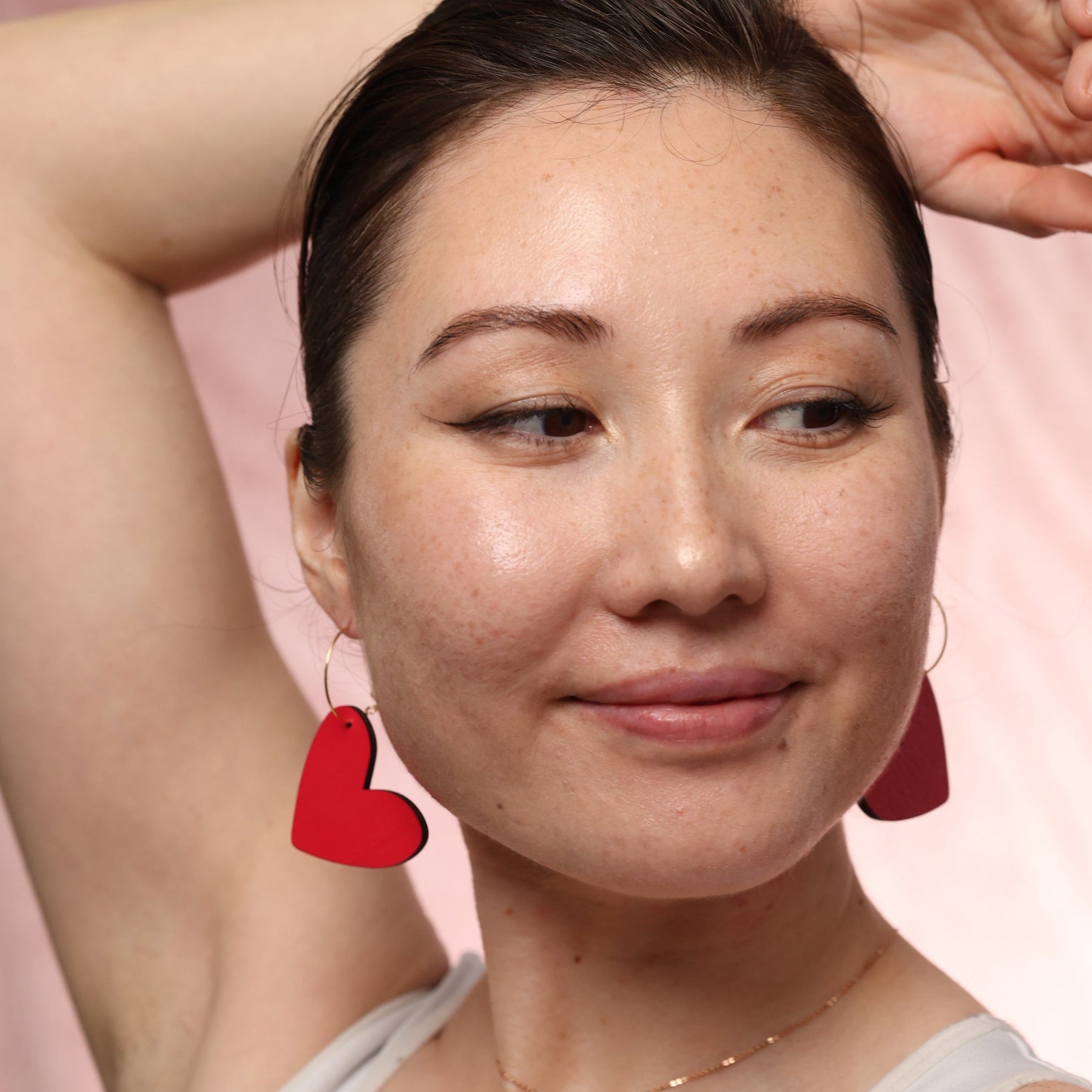 Additional view of Red Heart Hoop Earrings hand painted on lightweight wood by LE CHIC MIAMI