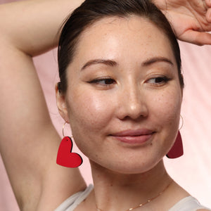 Additional view of Red Heart Hoop Earrings hand painted on lightweight wood by LE CHIC MIAMI