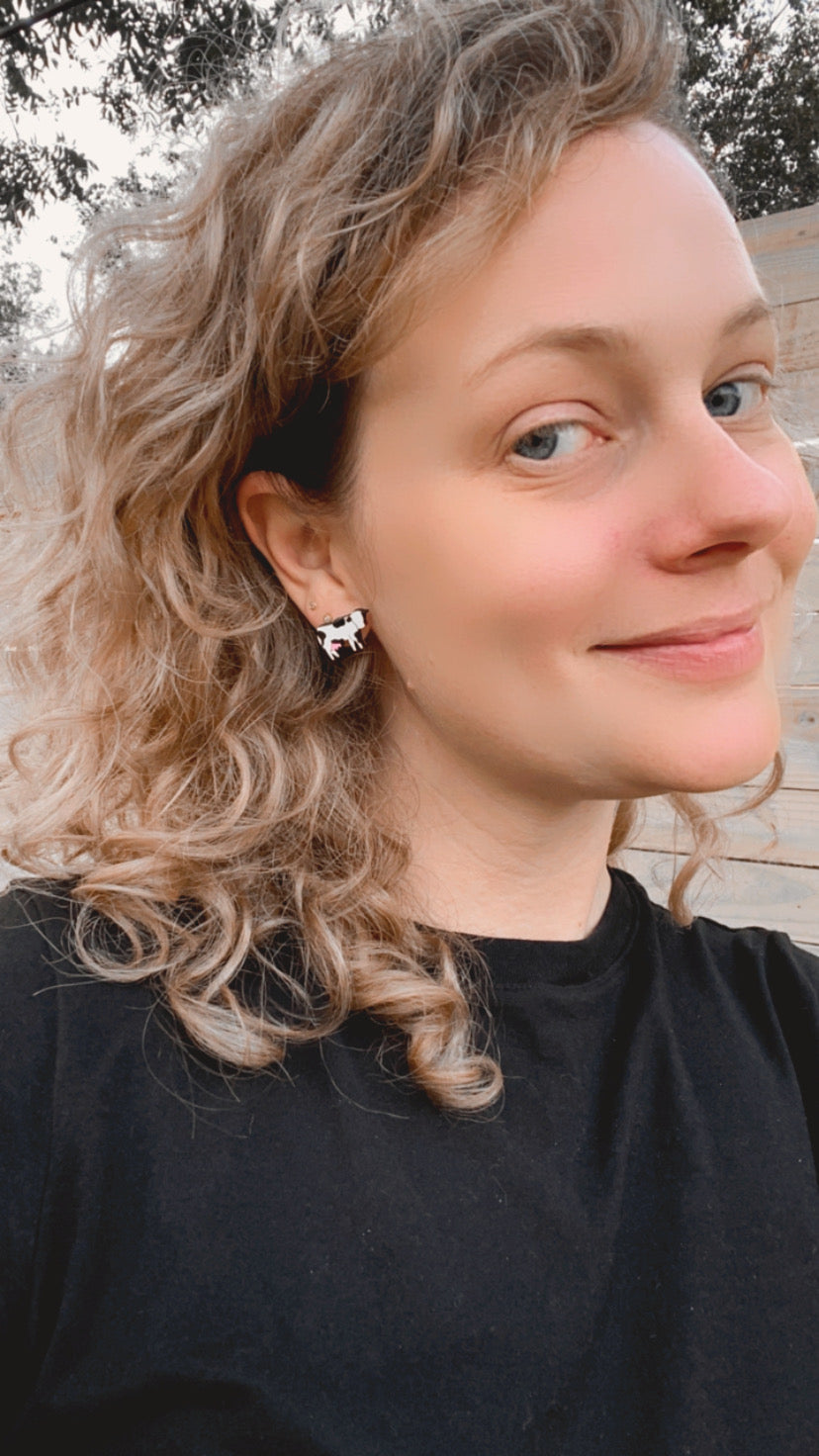 Additional view of Cow Stud Earrings, 2 Colors Available hand painted on lightweight wood by LE CHIC MIAMI