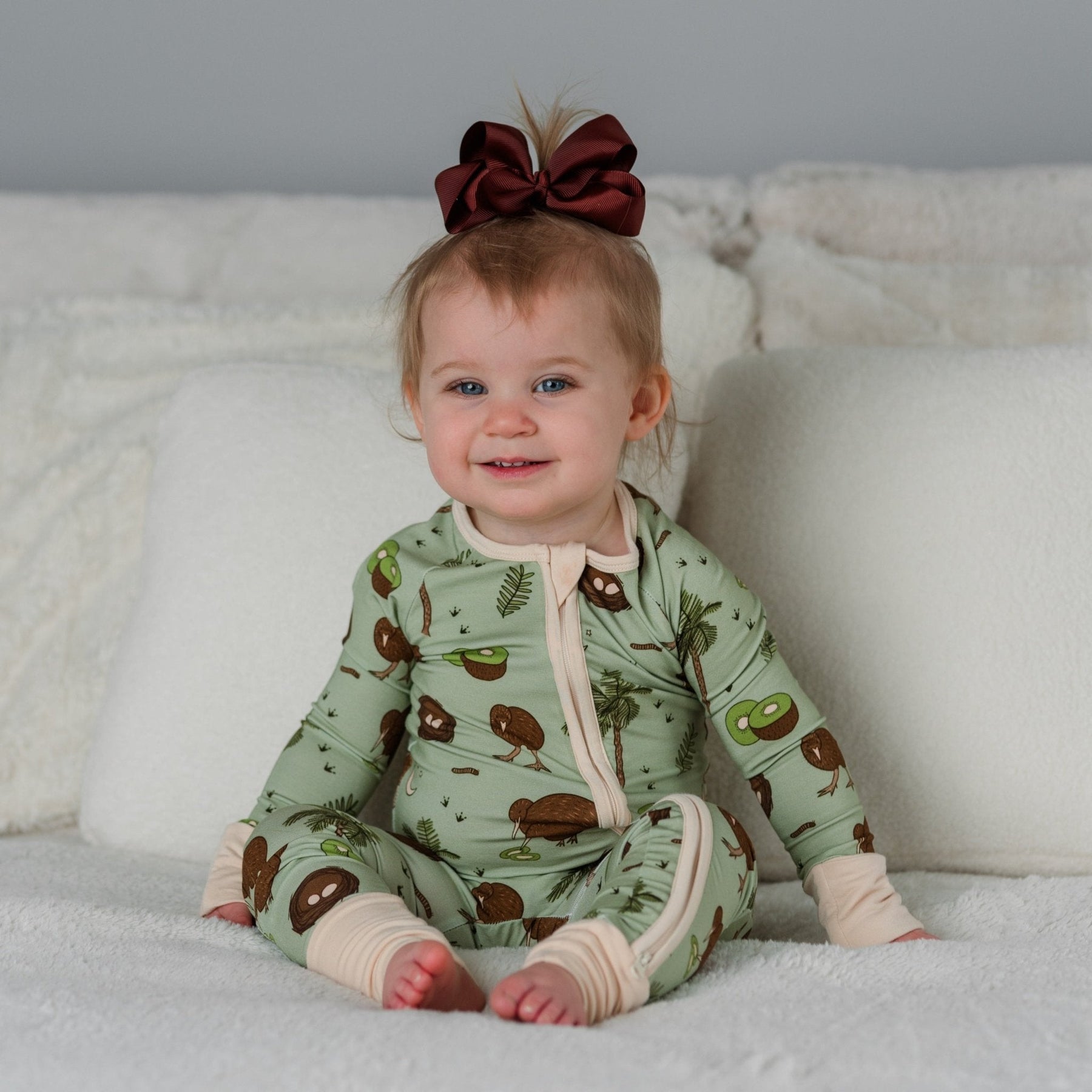 Additional view of Kiwi Bird bamboo baby zip pajamas with hand drawn animal print