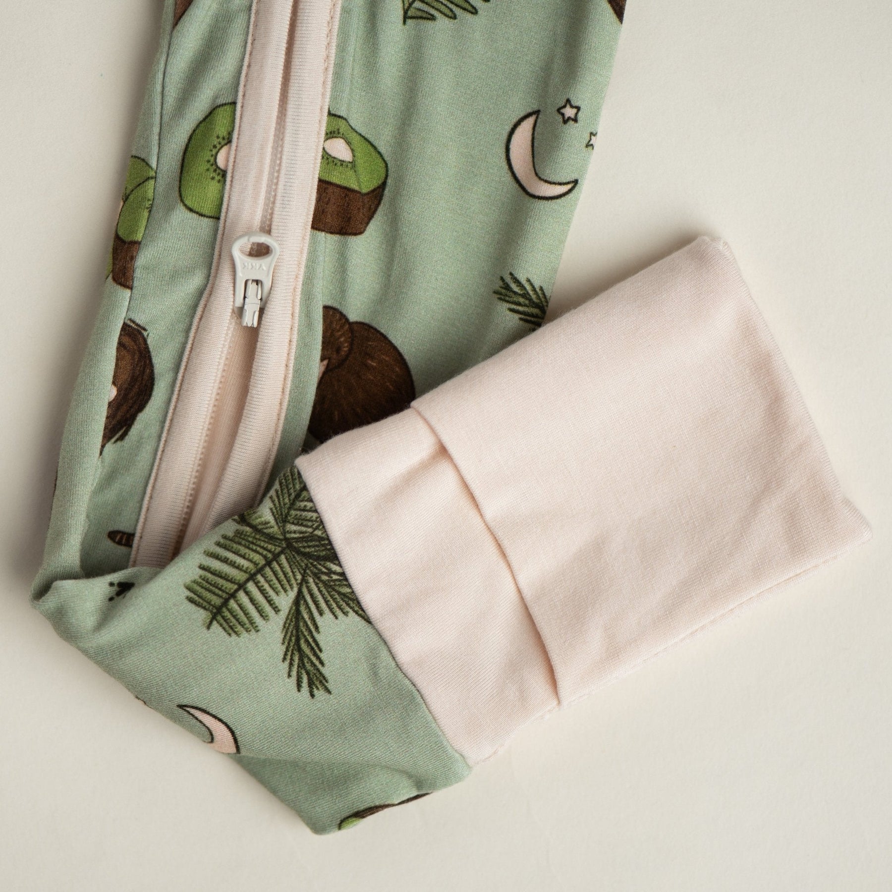 Additional view of Kiwi Bird bamboo baby zip pajamas with hand drawn animal print