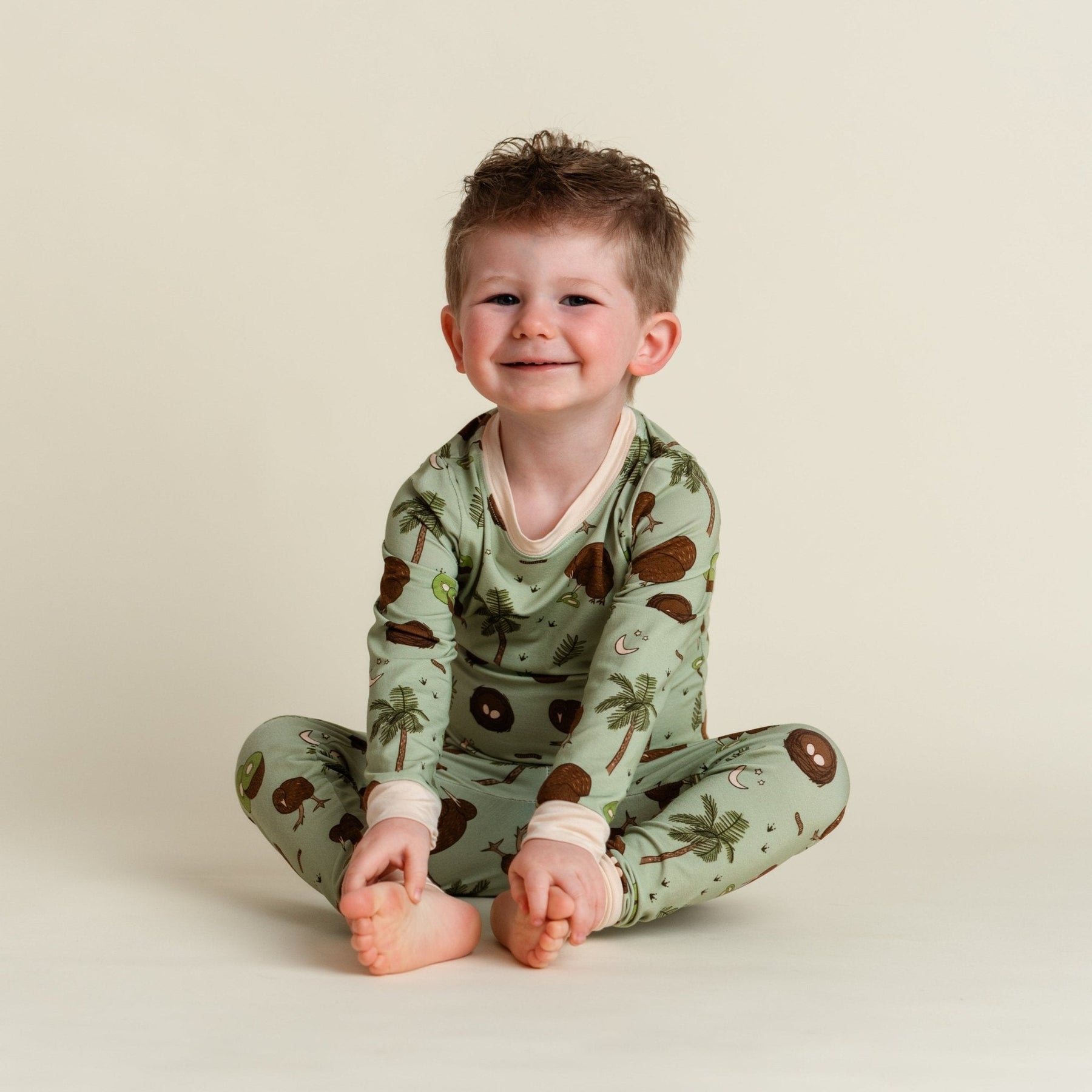 Additional view of Kiwi Bird bamboo two piece pajamas for kids with hand drawn animal print