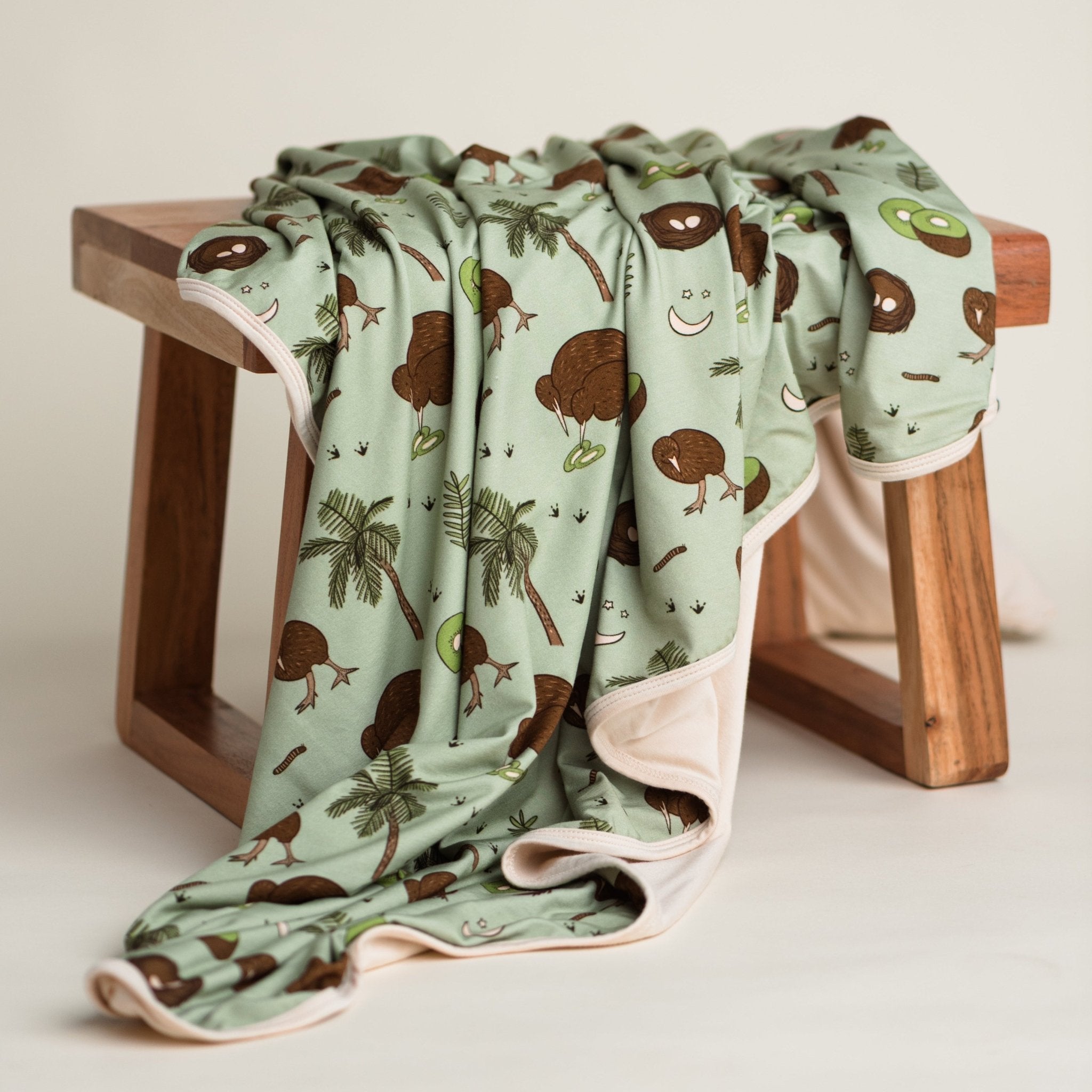 Additional view of Kiwi Bird reversible bamboo blanket with hand drawn animal print