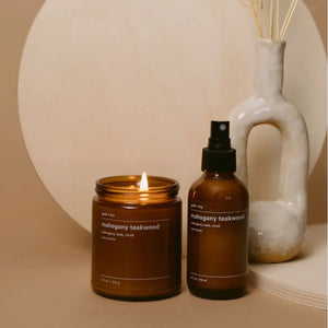 Mahogany Teakwood candle and room spray by Gold + Ivy with scent notes mahogany, teak, musk.