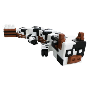 Minecraft-inspired articulated cube cow surprise figure shown from the opposite side