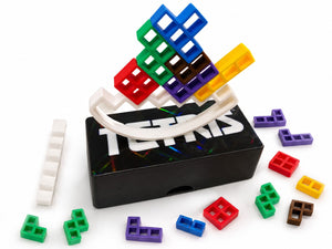 Mini Tetris style travel puzzle game with colorful blocks on a white table
