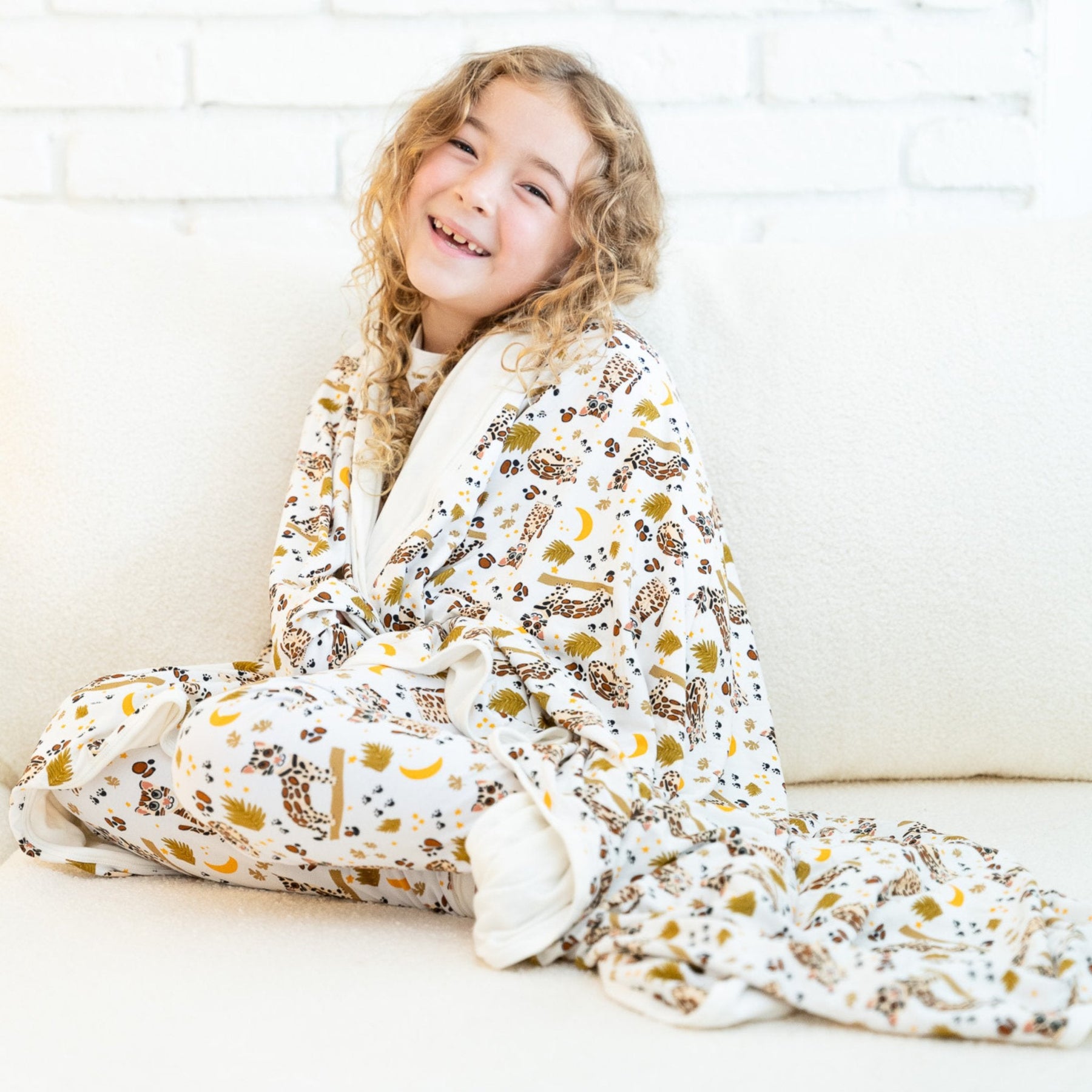Additional view of Ocelot reversible bamboo blanket with hand drawn animal print