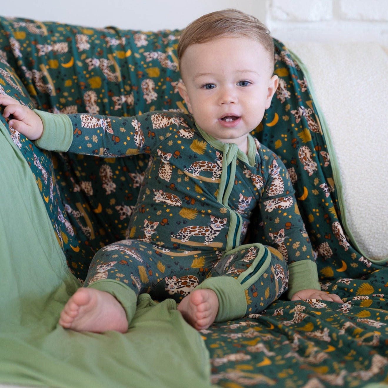 Additional view of Ocelot reversible bamboo blanket with hand drawn animal print
