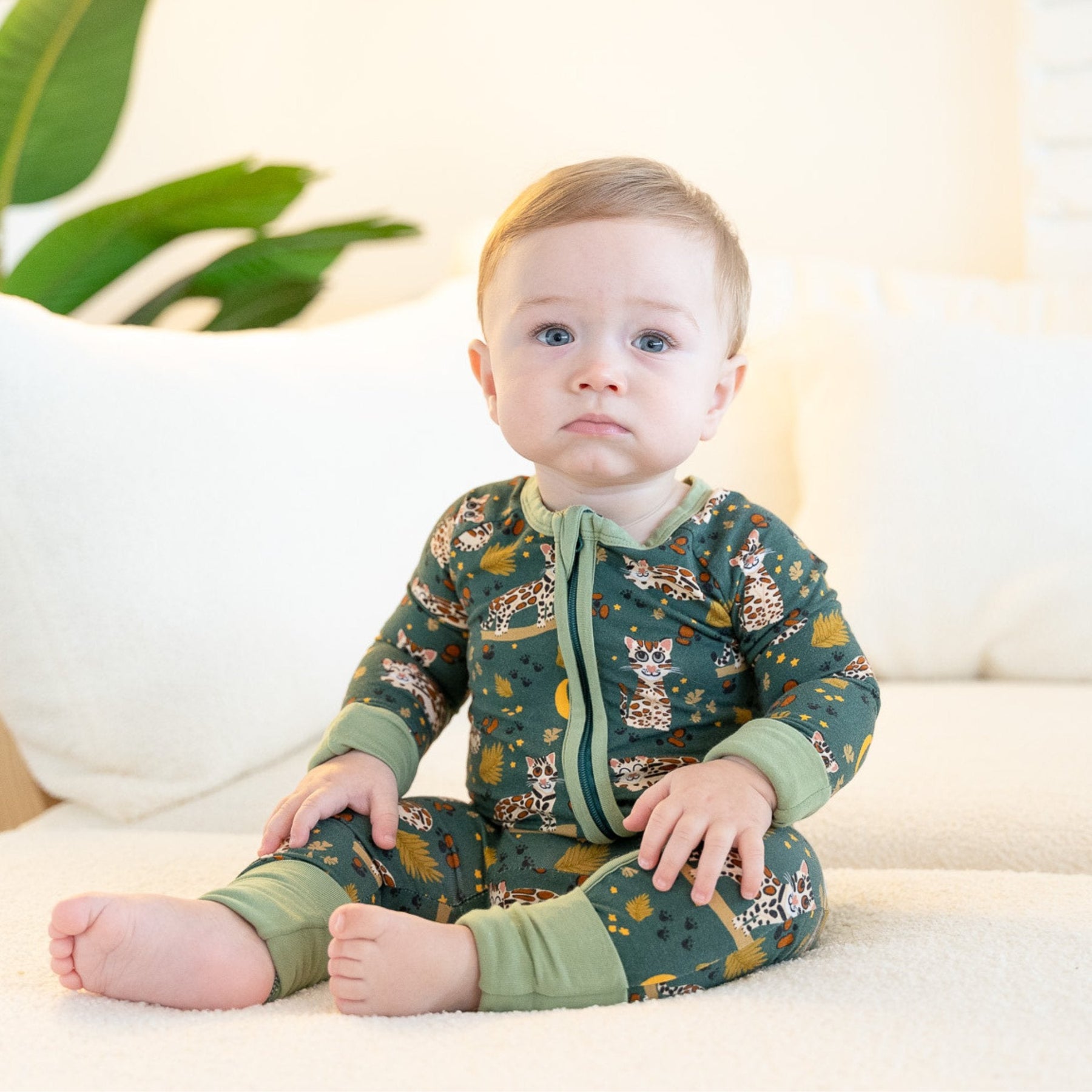 Additional view of Ocelot bamboo baby zip pajamas with hand drawn animal print