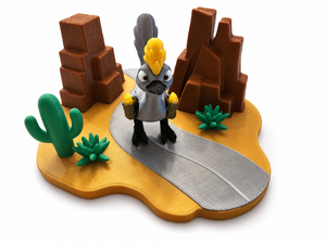 Front view of 3D printed roadrunner bird toy standing on desert road playset
