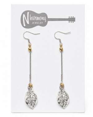 Pair of leaf-shaped earrings on a 'N Harmony Jewelry' card.