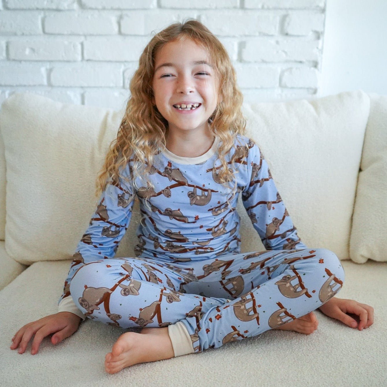 Additional view of Sloth bamboo two piece pajamas for kids with hand drawn animal print
