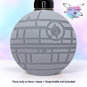 Orbital Battle Station interchangeable face by The Tween Space; choose face only or face plus a standard soap-holder base. Soap bottle is for display only.